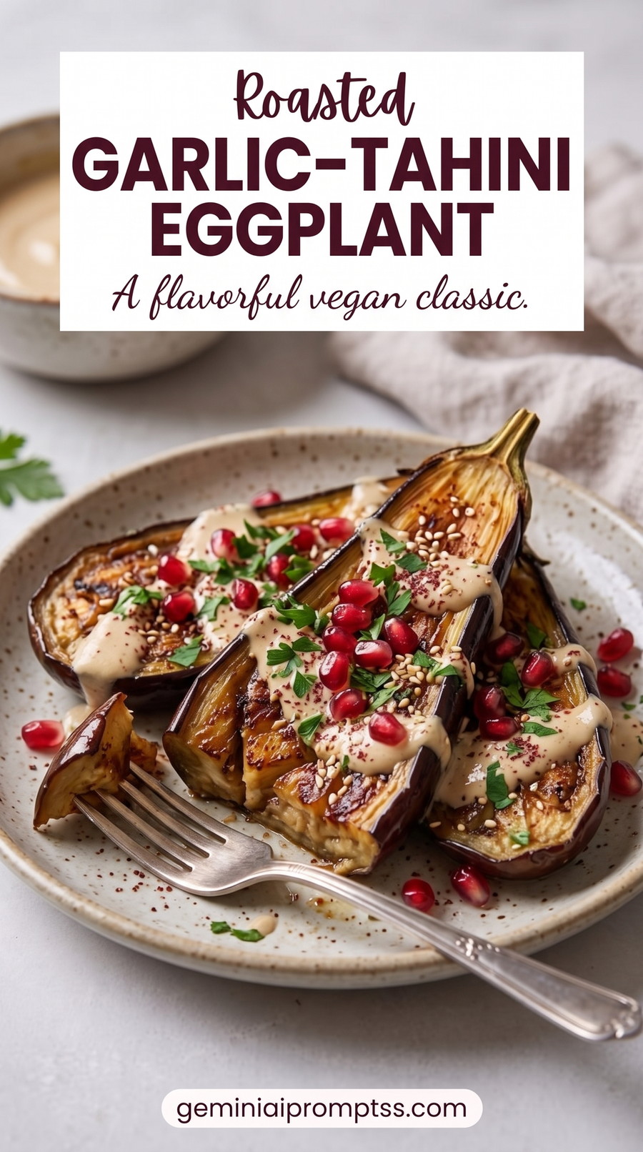 Roasted Garlic-Tahini Eggplant with Pomegranate showing roasted eggplant with pale tahini sauce, pomegranate, herbs, and toasted seeds